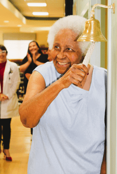 Wanda Knight Ringing the Survivor Bell